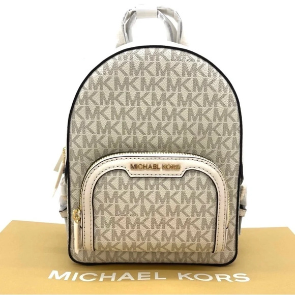 Michael Kors Jaycee Extra Small Convertible Zip Packet Backpack Cream/White - Picture 2 of 10